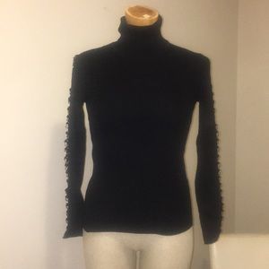 Black Zara turtleneck with sleeve detail